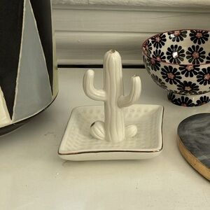 White and gold cactus ring holder from Anthropologie